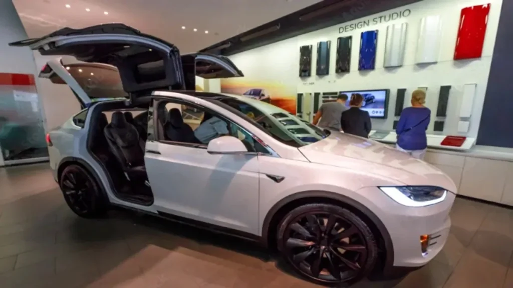 los angeles, california, united states of america august 21, 2018 rear view of white tesla electric model x suv with falcon wings doors in santa monica tesla store of los angele